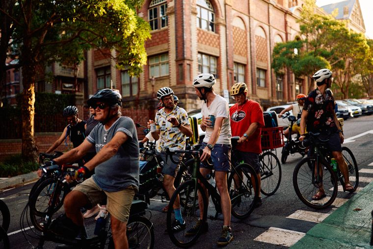 The Sydney Bike Rave pack rolling at golden hour